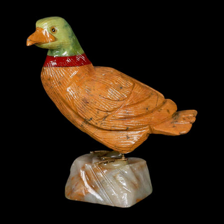 3.3" Hand Carved Duck Perched on Brown Calcite, Red Calcite, And Serpentine Peru